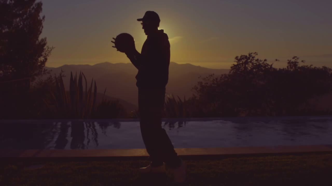 Scottie Pippen holding the actual Game 5 Ball at sunset.